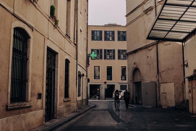 A thermometer reads 38°C in the shade at 5 pm in the centre of Nîmes, August 12, 2025.