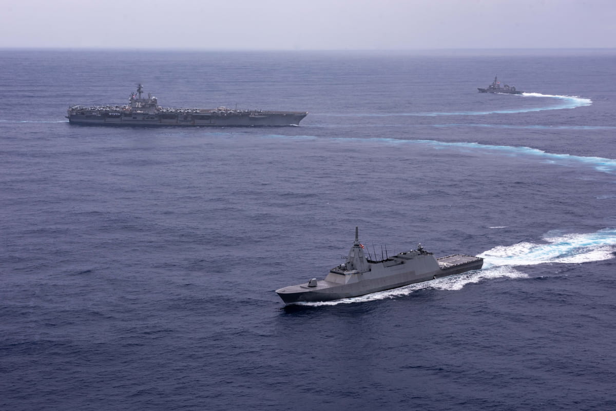 Mogami-class frigate JS Noshiro, foreground, breaks away during exercises with the US Navy in the Philippine Sea (Caroline H. Lui/US Navy Photo)