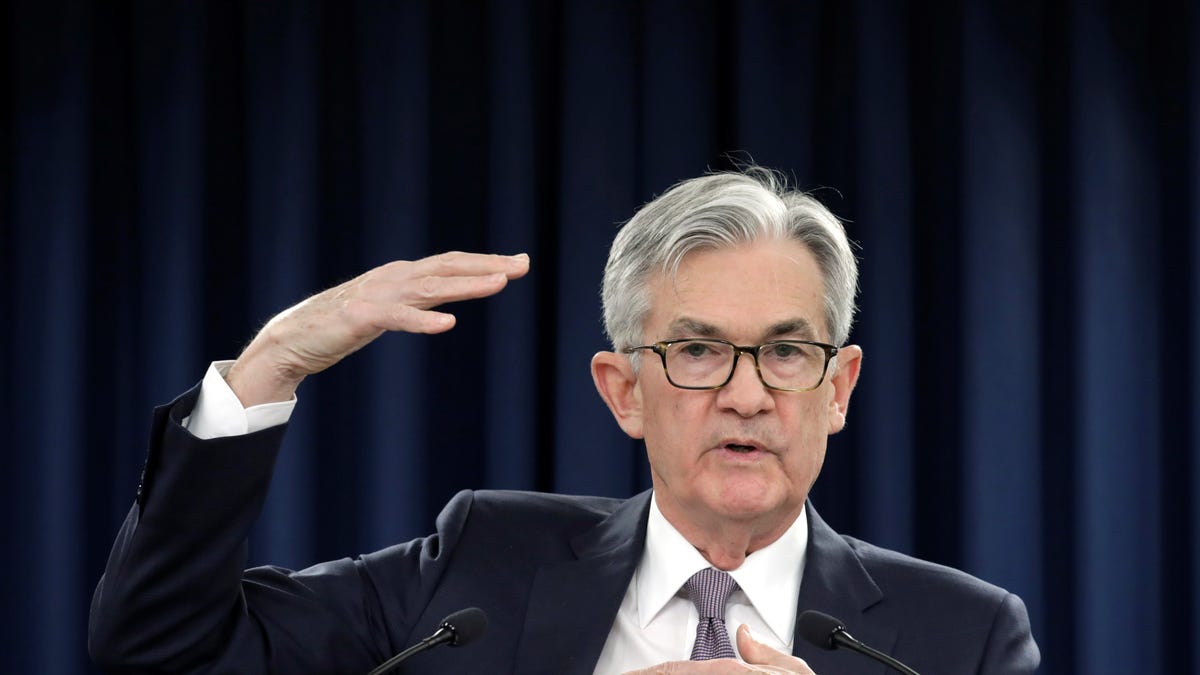 Powell treads fine line on rate cut message
