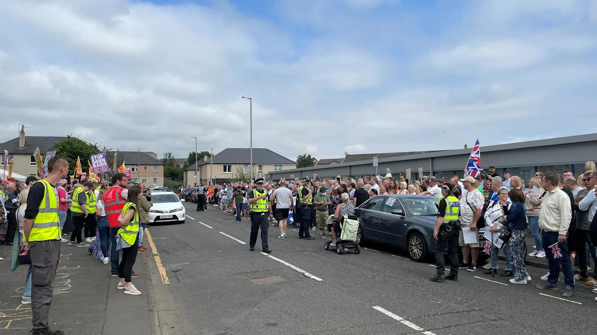 Anti-racism demonstrators stage counter-protest outside asylum seekers hotel