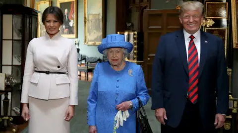 PA Media US President Donald Trump's first state visit to UK in 2022, meeting Queen Elizabeth II with his wife, Melania, during their visit to Windsor Castle.