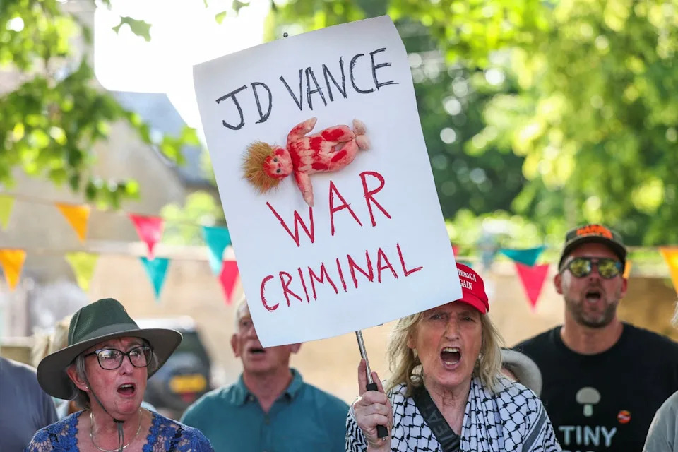 A number of protesters referenced the US government’s support for Israel amid the starvation and bombardment of Gaza, with several placards reading ‘end the genocide’ and calling the vice president a ‘war criminal’ (Reuters)