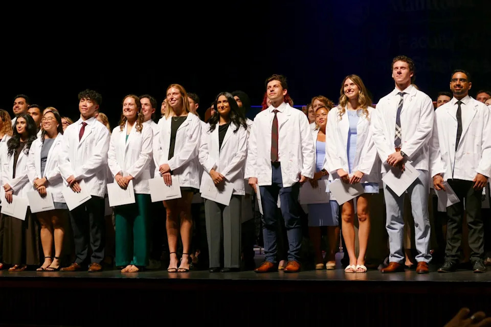 First-year medical students at the Max Rady College of Medicine received white coats at a Wednesday, Aug, 20, 2025, ceremony in Winnipeg, officially welcoming them to the start of their med school studies.