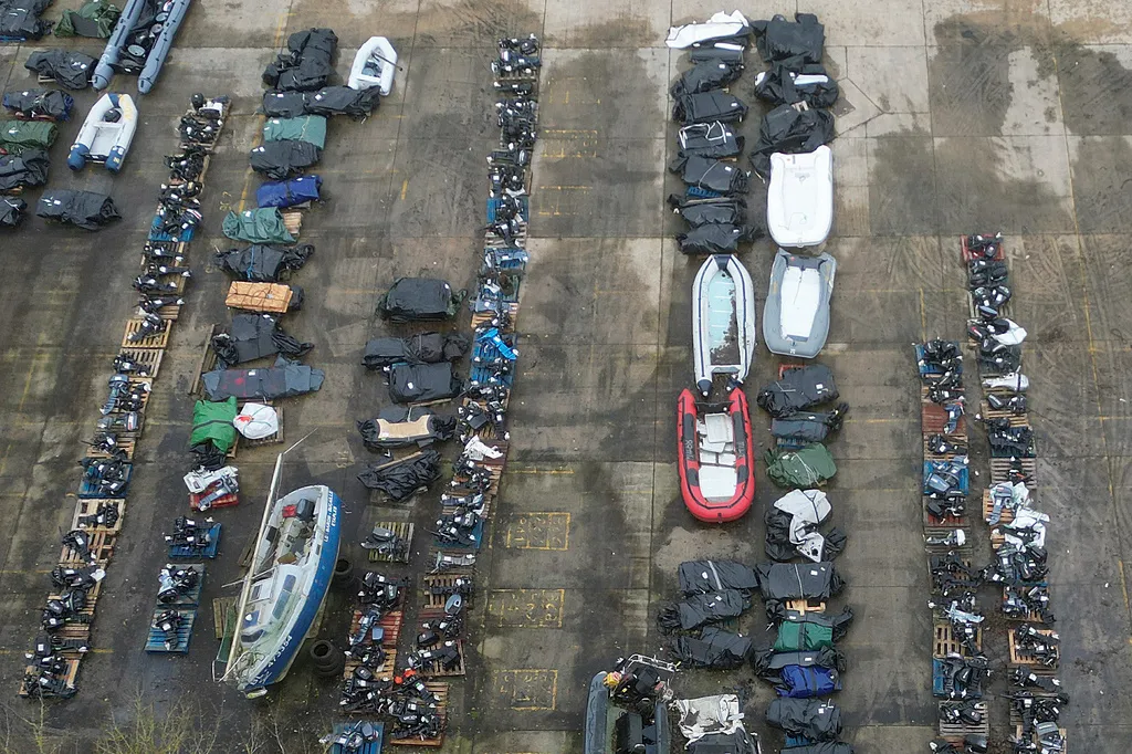 A general view of small boats and inflatable dinghies in a Border Force compound after being confiscated from migrants attempting to cross the channel to Britain from France in Dover, England, Wednesday, Feb. 26, 2025.