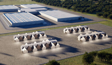 A conceptual rendering shows a data center co-located with a series of Aalo Pod reactors, a 50 MWe concept being developed by Aalo.