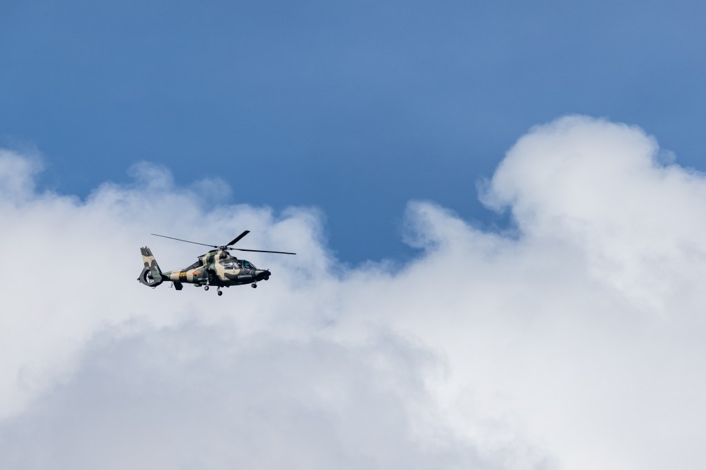 People's Liberation Army helicopter over Hong Kong.