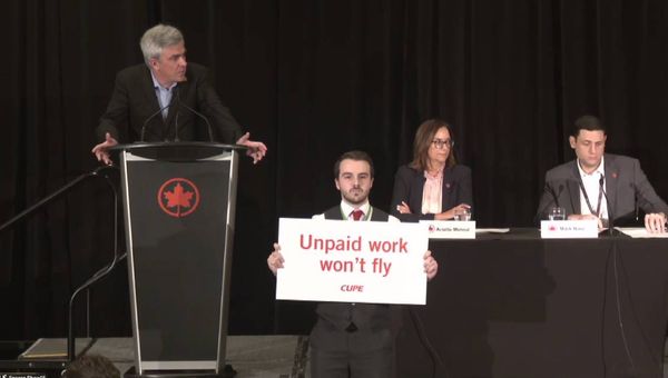 Air Canada flight attendants interrupted an Air Canada press conference on Aug. 14. Air Canada flight attendants interrupted an Air Canada press conference on Aug. 14.