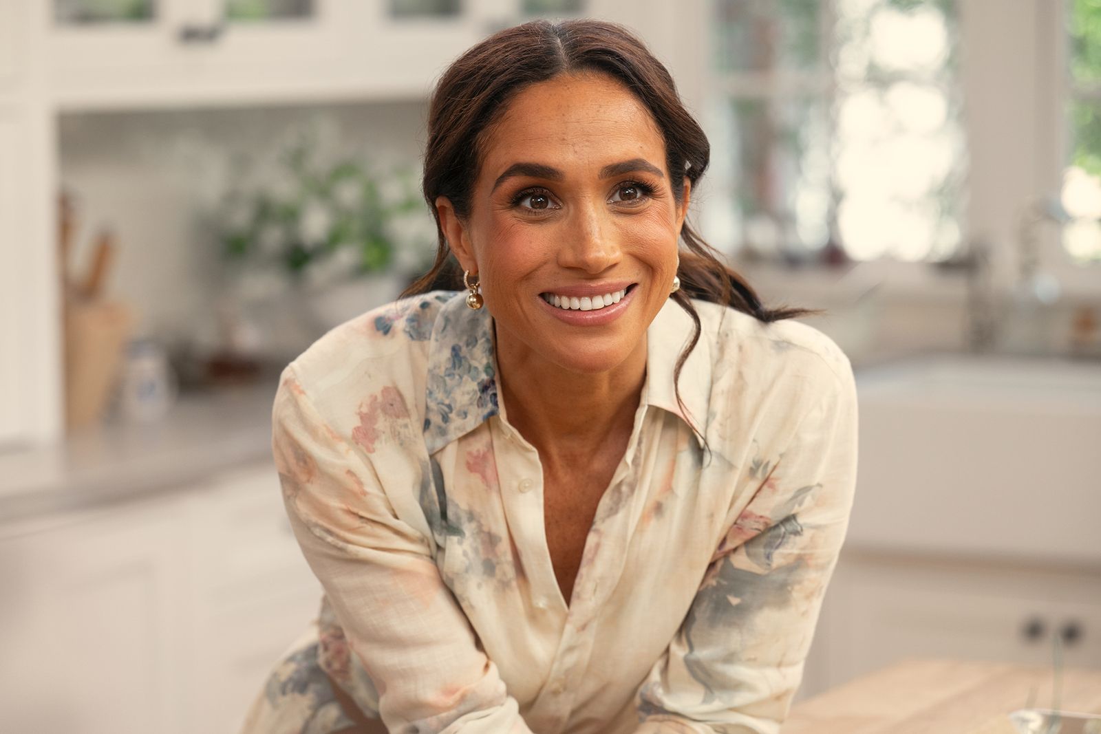 Image may contain Meghan Duchess of Sussex Head Person Face Happy Smile Adult and Dimples