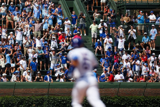 Cubs fans cheer after Matt Shaw hit a home run during the seventh inning against the Royals at Wrigley Field on July 23, 2025. (Eileen T. Meslar/Chicago Tribune)