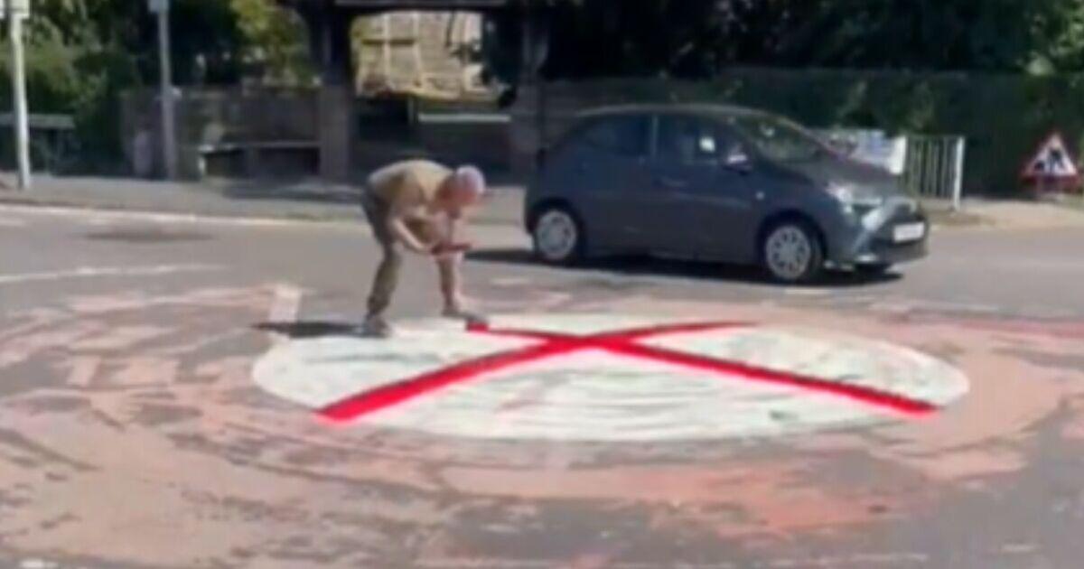 Defiance in Birmingham as man paints St George's cross on roundabout