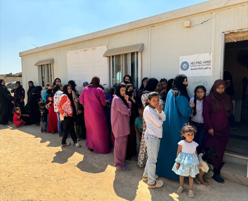 Refugee families gather for free medical treatment offered by Zarqa Baptist Church and The Church of Jesus Christ of Latter-day Saints near Zarqa, Jordan.