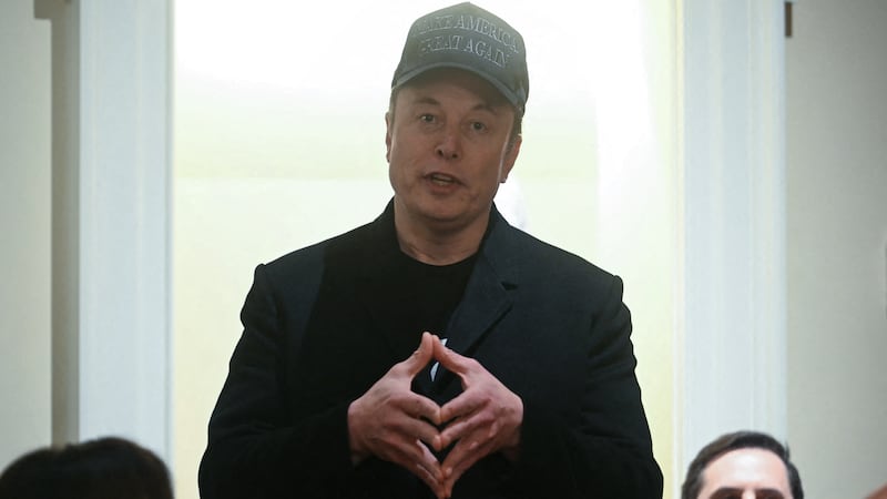Leader of the Department of Government Efficiency Elon Musk speaks during a cabinet meeting with US President Donald Trump at the White House in Washington, DC, on February 26, 2025. (Photo by Jim WATSON / AFP) (Photo by JIM WATSON/AFP via Getty Images)