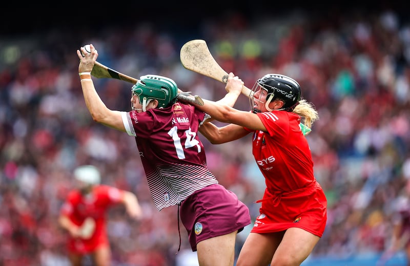 Galway's Niamh Mallon and Laura Hayes of Cork.
Photograph: INPHO/ Bryan Keane