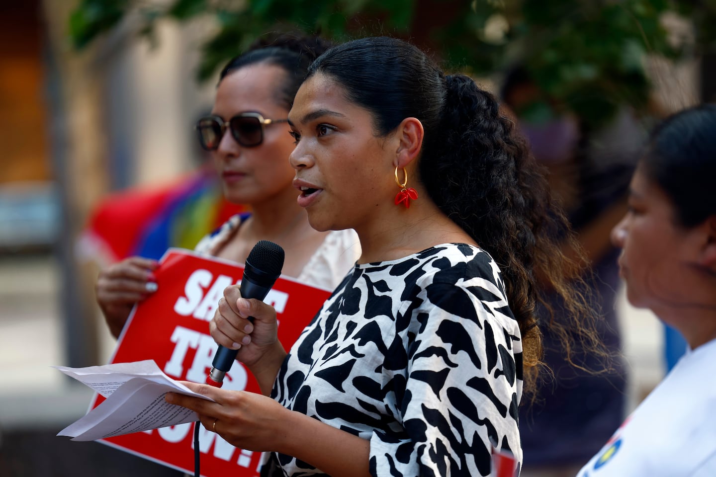 Jackey Baiza, who came to the United States from Honduras at age 2, spoke during a rally in solidarity with TPS holders from Honduras, Nepal, and Nicaragua during a vigil on July 29 in Boston.