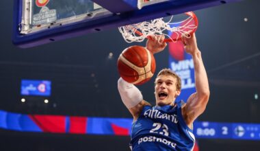 Lauri Markkanen #23 of Finland dunks the ball