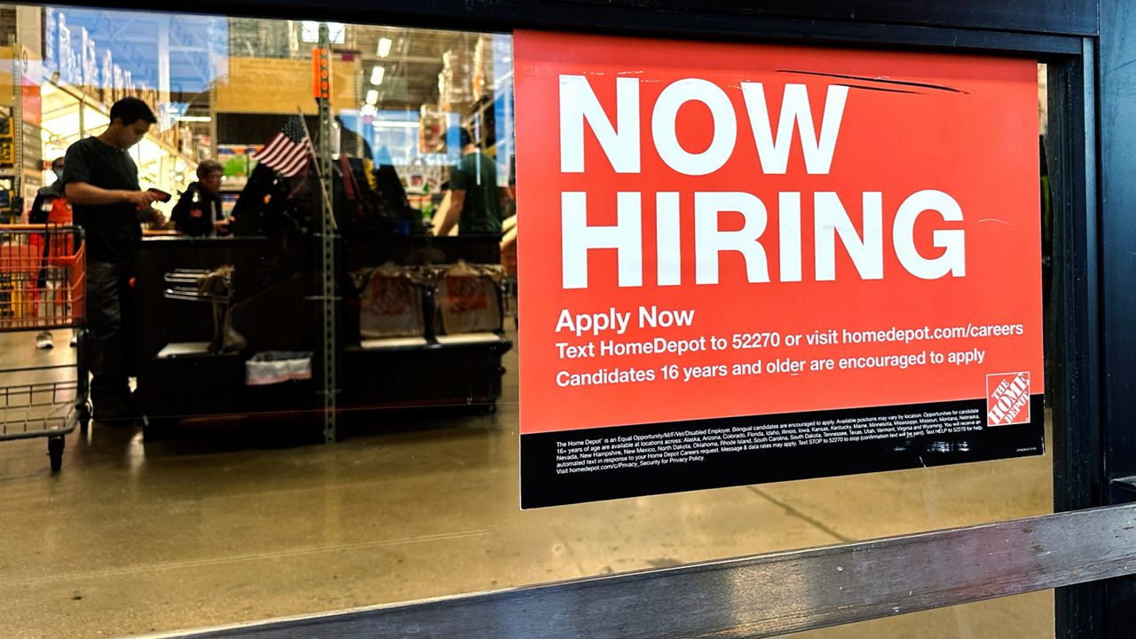 A hiring sign is displayed at a retail store in Mount Prospect, Ill., Saturday, Nov. 2, 2024. (AP Photo/Nam Y. Huh, File)