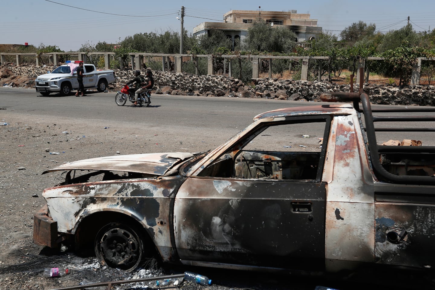 A Syrian security checkpoint as forces deployed in Mazraa village on the outskirts of Sweida city, in southern Syria, on July 20.