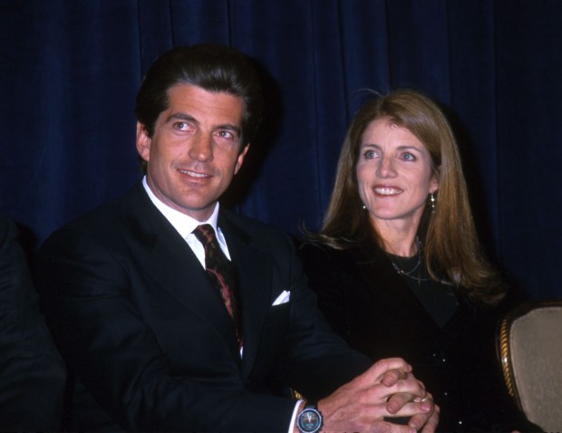 FILE PHOTO: John F. Kennedy, Jr. and sister Caroline Kennedy March 8, 1999. (Photo by Diane Freed)