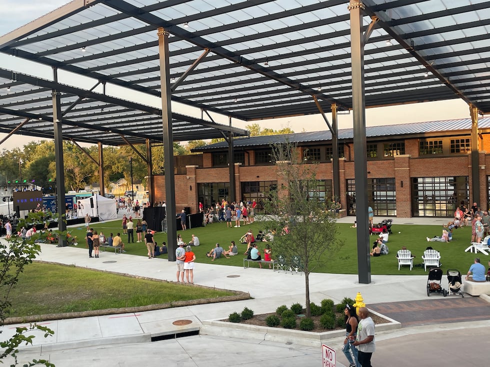 People packed downtown Lee’s Summit Friday night for the grand opening of Green Street, an...