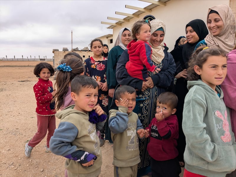 Refugee families gather for free medical treatment offered by Zarqa Baptist Church and The Church of Jesus Christ of Latter-day Saints near Zarqa, Jordan.