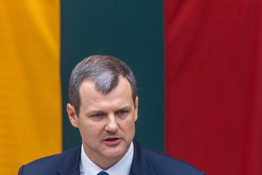 Lithuania's prime minister steps down after investigations, protests