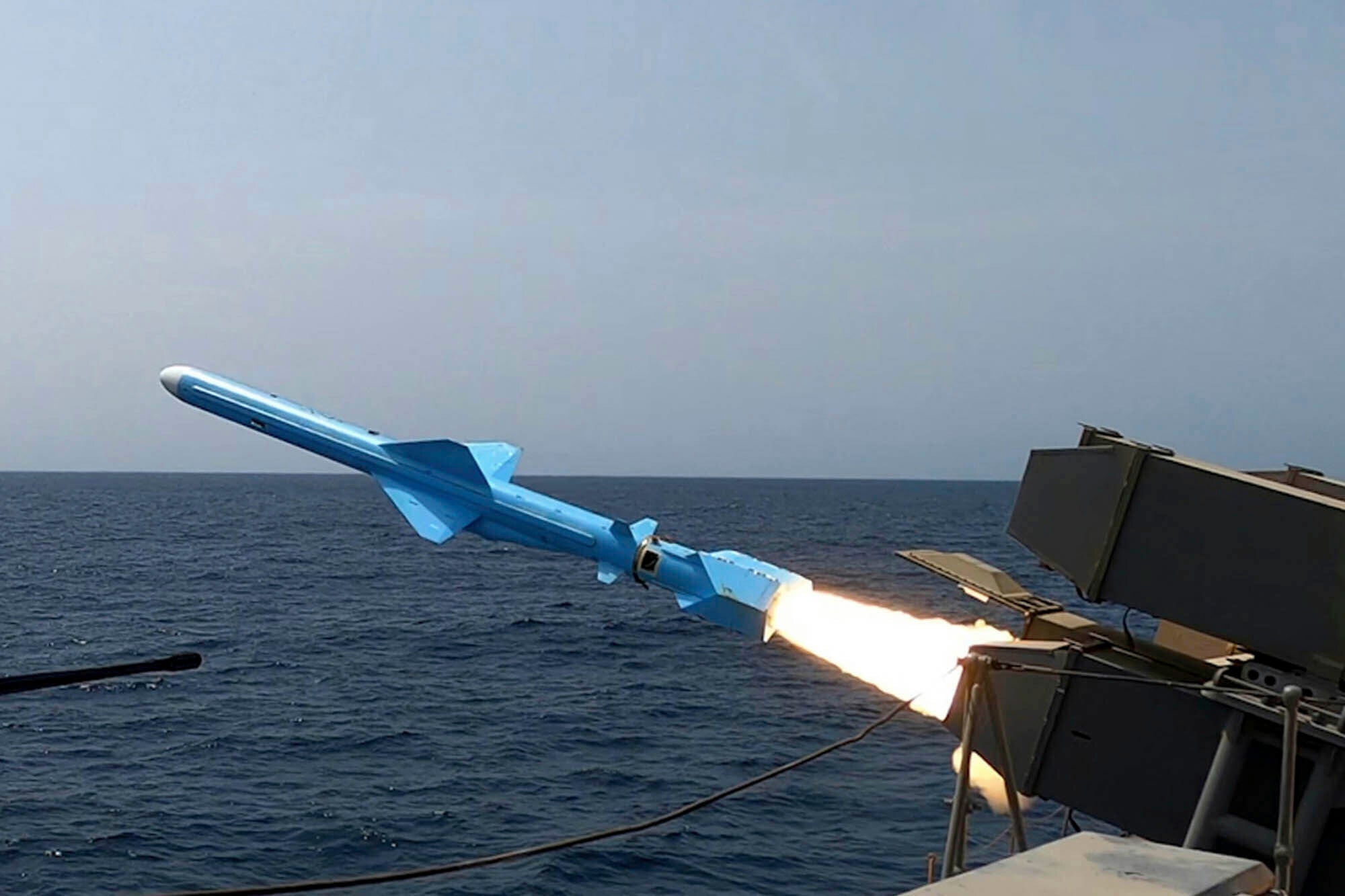 In this picture released by the official website of the Iranian Army on Thursday, Aug. 21, 2025, a missile is fired from a vessel during Iranian navy drill in the Gulf of Oman and the Indian Ocean.