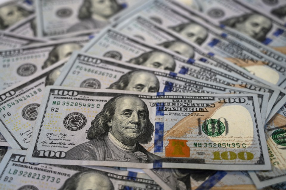 A pile of US $100 bills.