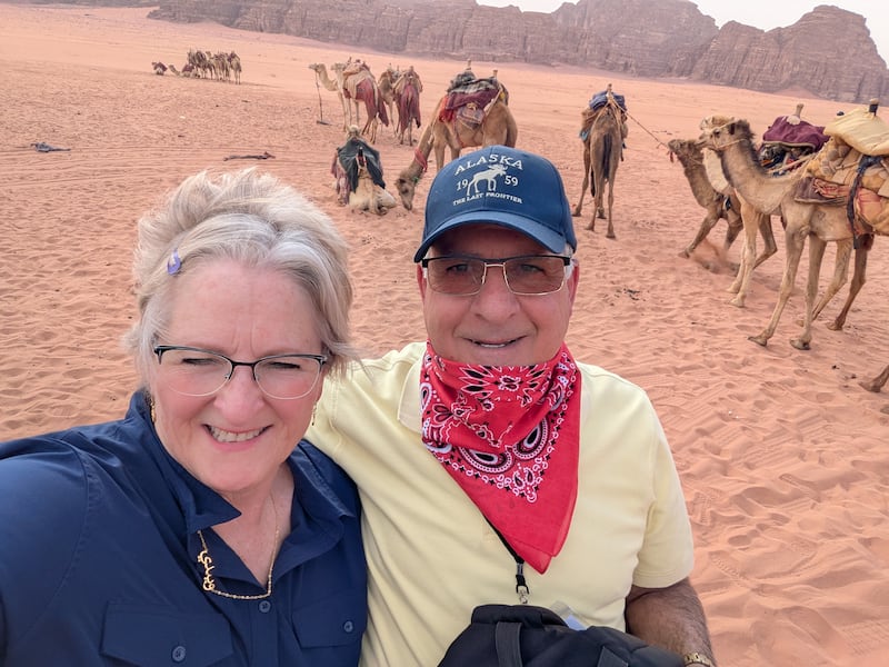 Wendy and Rizek Housari pose for a photo in the Wadi Rum valley in Jordan in April 2025.