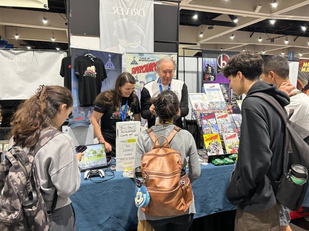 Pasadena's Bob Wyman and daughter Sally Krueger-Wyman discuss the comic book series they've co-written called "Supercharged!" at San Diego Comic-Con on July 26, 2025. (Photo by Erik Pedersen/SCNG)