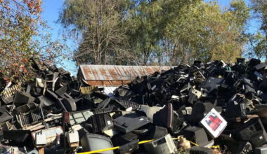 Pile of TVs before a fire