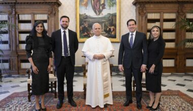 Pope Leo XIV stands for a family photo with Vice President JD Vance, second from left, his wife Usha Vance, Secretary of State Marco Rubio, second from right, and his wife Jeanette Dousdebes Rubio, on the occasion of their meeting at the Vatican, Monday, May 19, 2025. (Vatican Media via AP)