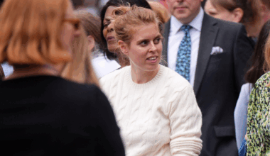 Princess Beatrice wearing a cream sweater in a crowd