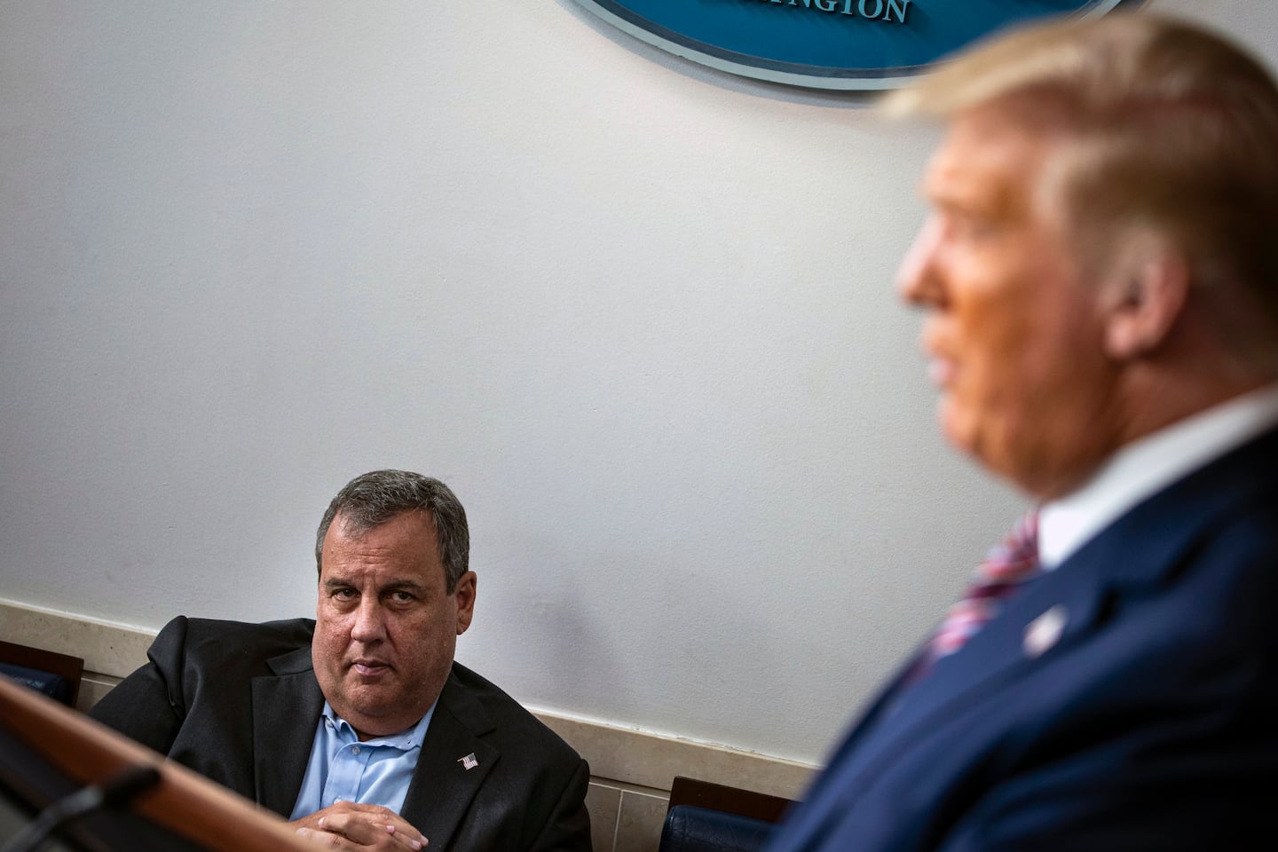 Former Gov. Chris Christie of New Jersey looks on as President Donald Trump speaks to reporters at the White House on Sept. 27, 2020.