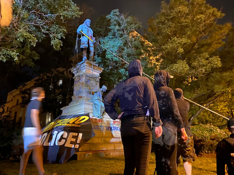 WASHINGTON, DC - JUNE 19:  Demonstrators attempt to topple the Albert Pike Statue in Washington, DC on June 19, 2020.  (Photo by Evelyn Hockstein for The Washington Post via Getty Images)