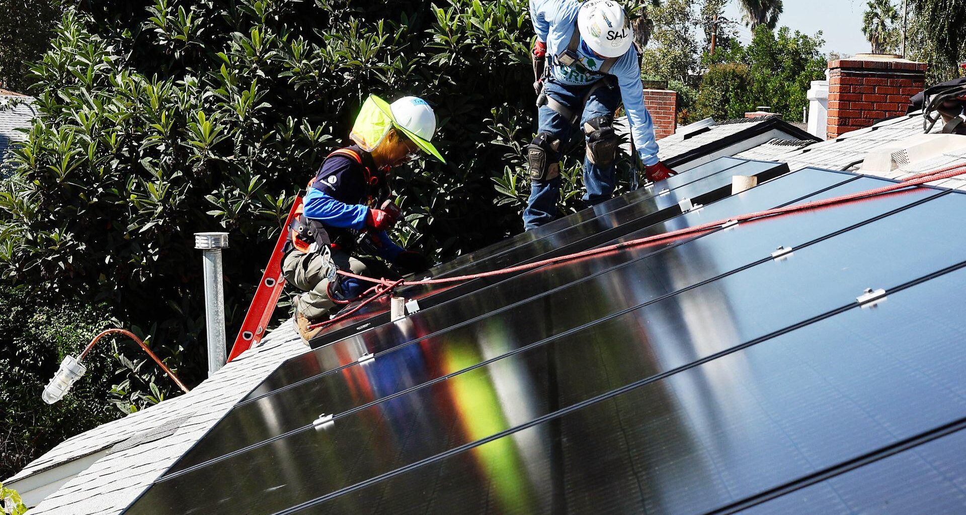 Canceled low-income solar grants set up legal fight with Trump, states
