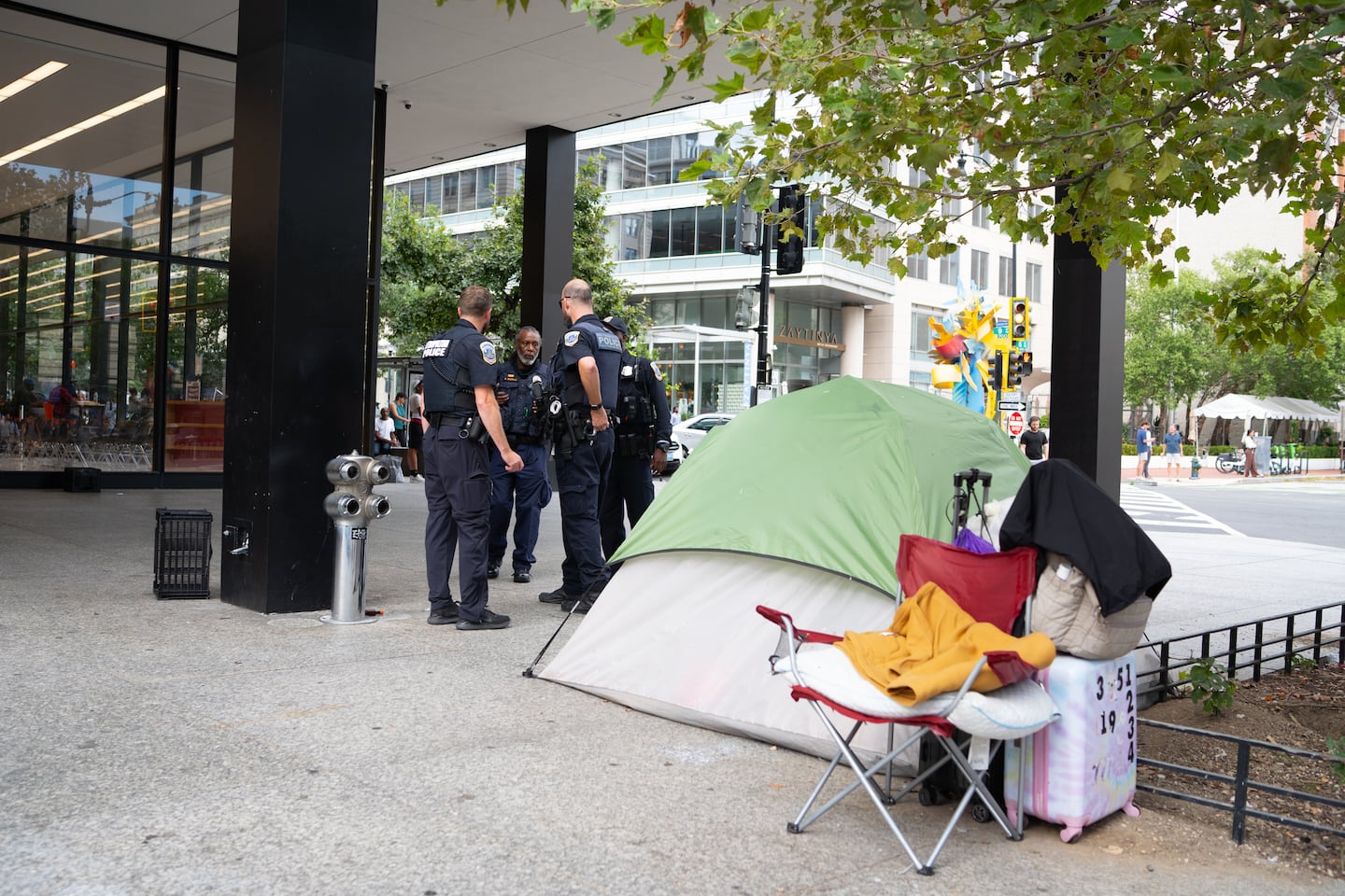 Police respond to a situation Tuesday at the Martin Luther King Jr. Memorial Library in downtown Washington.