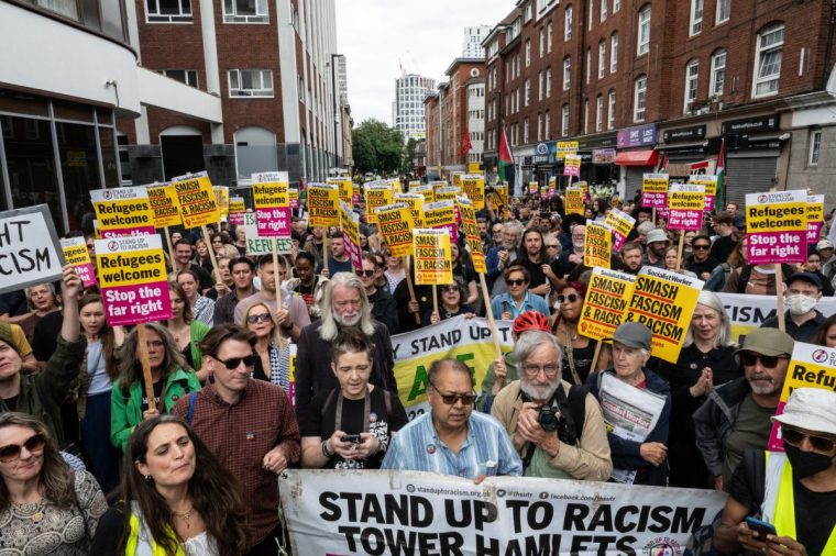 LONDON, ENGLAND - AUGUST 2: Stand Up To Racism hold a counter protest to the far right presence on August 2, 2025 in London, England. Far-right protests focusing on hotels housing asylum seekers have increased in recent weeks, organised by far-right protest groups such as the Democratic Football Lads Alliance (DFLA). Stand Up To Racism (SUTR) is holding counter-protests defending refugees at many of the sites, with more protests expected over the summer. (Photo by Guy Smallman/Getty Images) *** BESTPIX ***