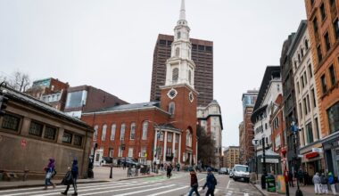 Pedestrians walked across Tremont Street, near the Park Street Church, in downtown Boston.
