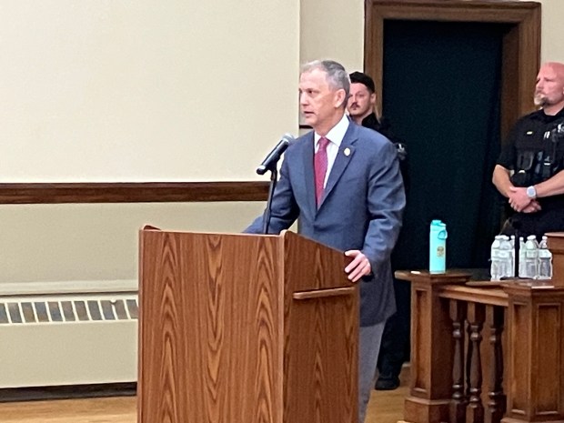 U.S. Rep. Sean Casten, a Democrat from Downers Grove, tries to address his constituents July 30, 2025, over the protests of pro-Palestinian demonstrators during a town hall meeting in La Grange. (Hank Beckman/for Pioneer Press)