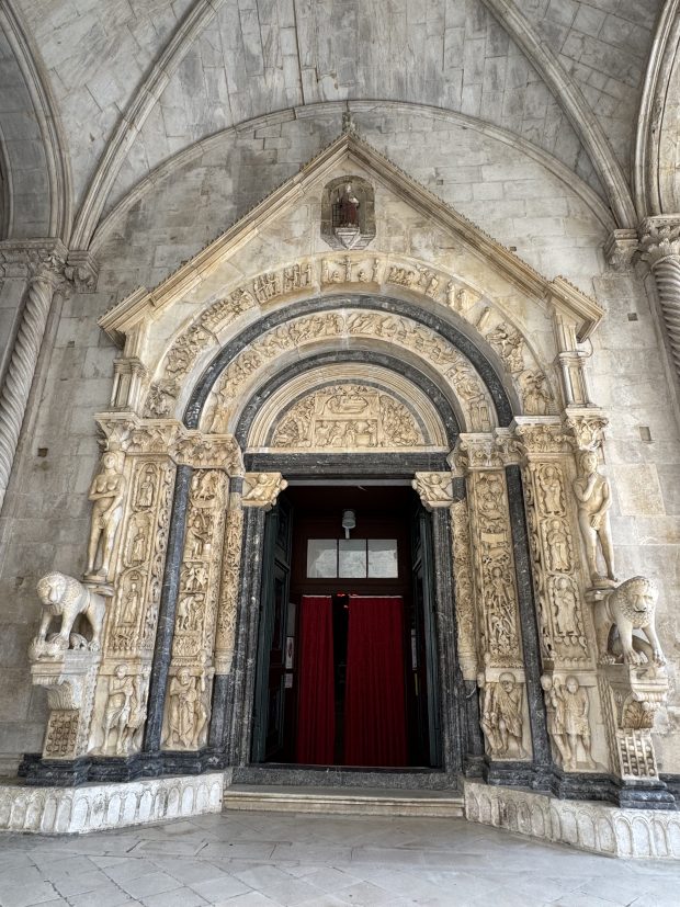 An ornate stone door.