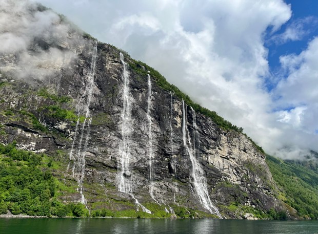 Seven waterfalls cascade down a mountain
