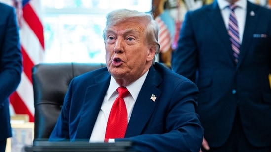 US President Donald Trump during an executive order signing in the Oval Office of the White House in Washington, DC(Bloomberg)