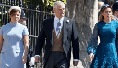 Princess Eugenie, Prince Andrew, and Princess Beatrice walk side by side towards St George's Chapel at Windsor Castle