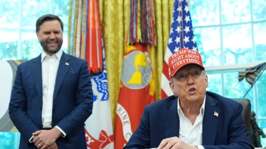 US Vice President JD Vance stands behind President Donald Trump in the Oval Office of the White House.(AP)
