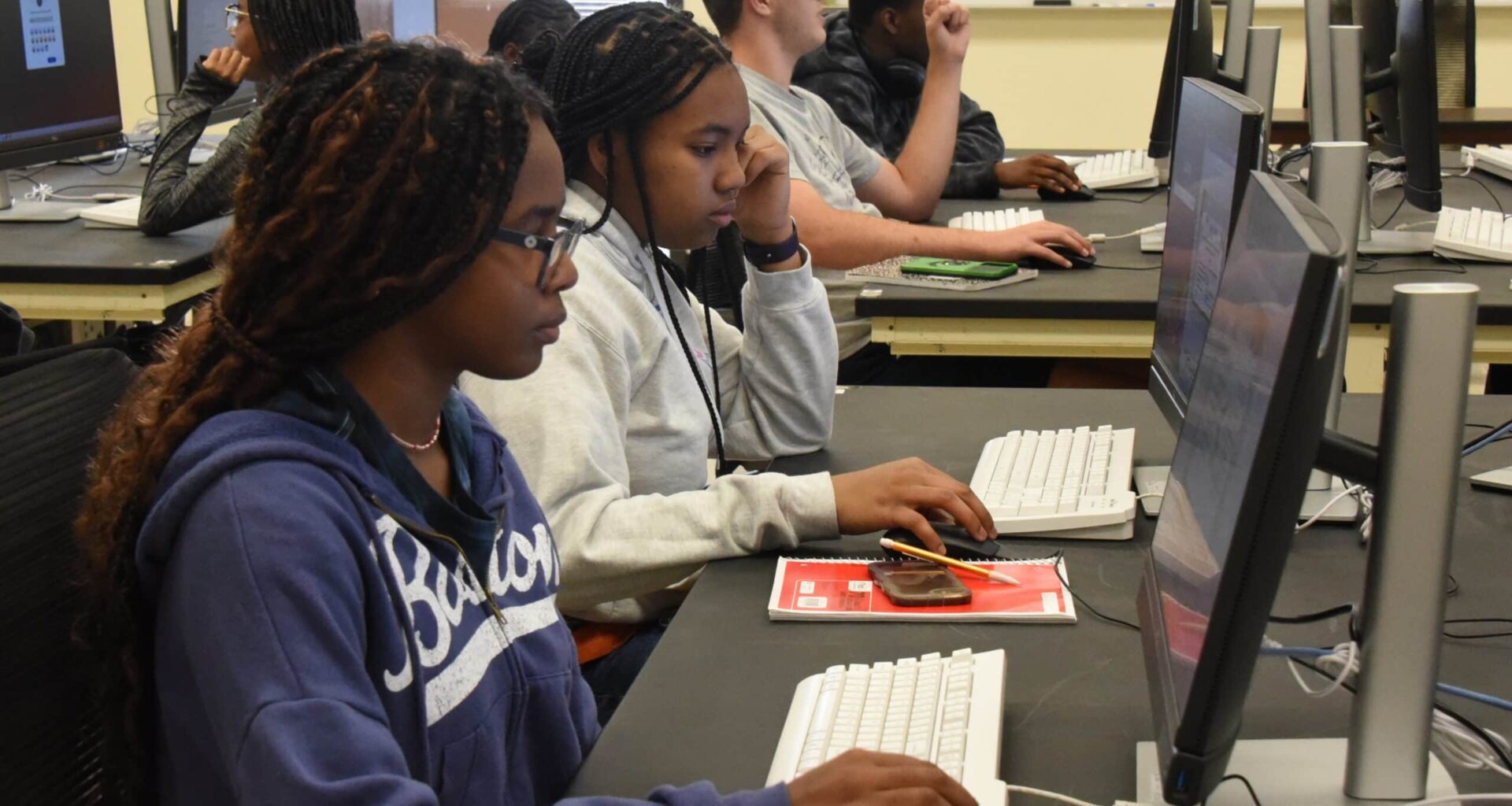 Students sit in a computer lab to work on their data-analysis projects during the AR Health Data Scholars’ Summer Bootcamp in Little Rock.