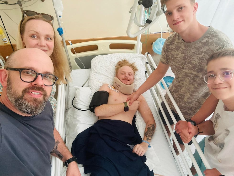 Eric Jessee with his family at the Lithuanian hospital.