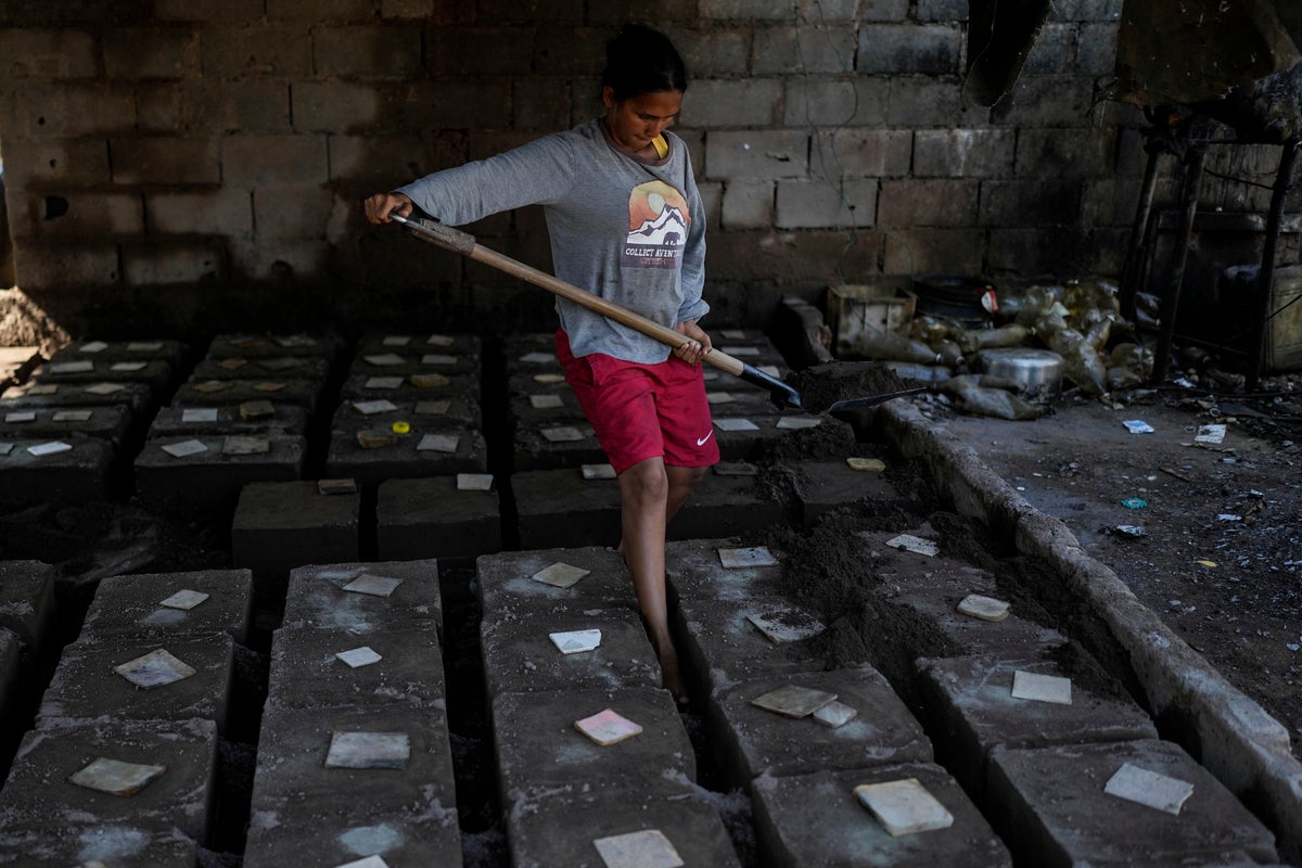 PHOTO ESSAY: Migrants returning to Venezuela face debt and harsh living conditions
