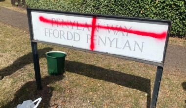 England flags and fascist symbols plastered around Welsh village