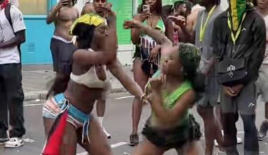 Moment women brawl in the street at Notting Hill Carnival - as police arrest 140 people on first day