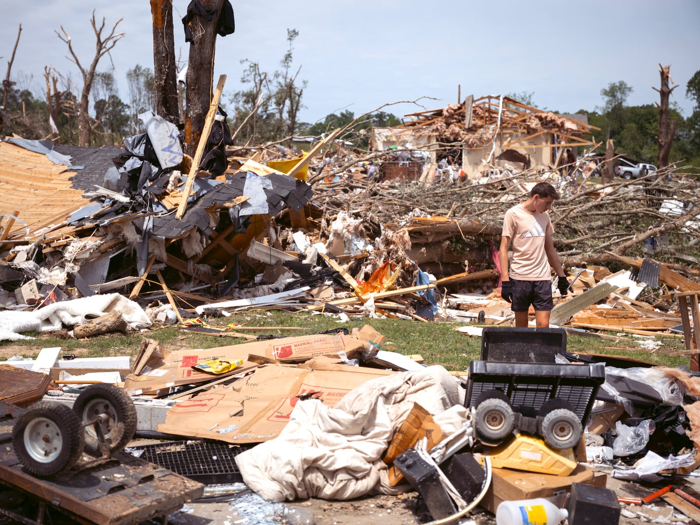 A resident walked through the remains of his home after a tornado in the Sunshine Hills neighborhood of London, Ky., on May 18. 